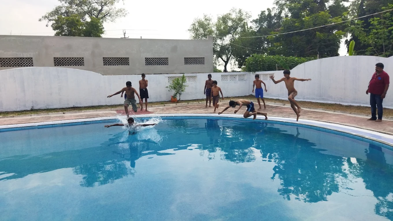 Students enjoying the swimming pool at The Nandyal Public School